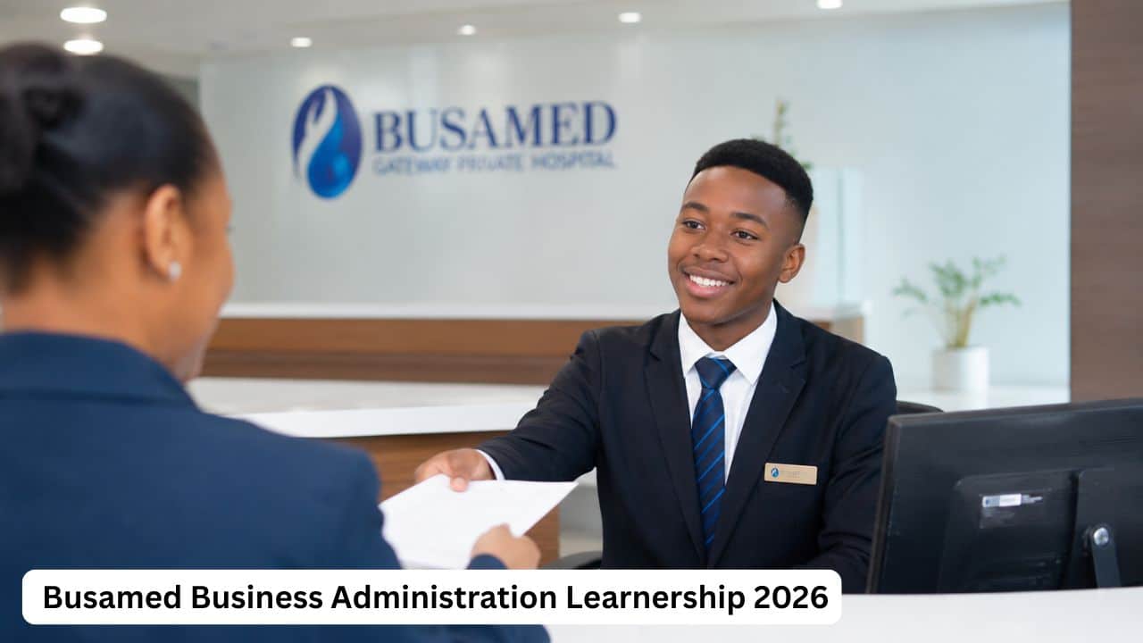 Young South African Business Administration learner working at an admin desk inside Busamed Modderfontein Private Hospital in 2026