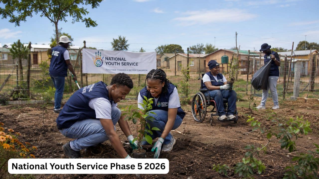 Young South African volunteers in service vests working together on a community greening project during National Youth Service Phase 5