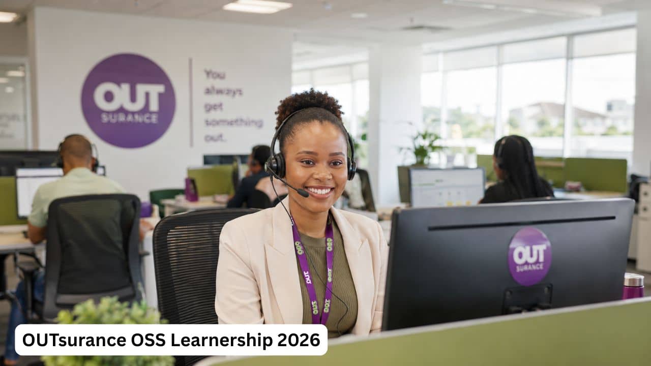 Young South African call centre agent wearing a headset at an OUTsurance workstation during the OSS Learnership